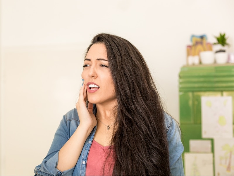 indications of a tooth infection extending to the body