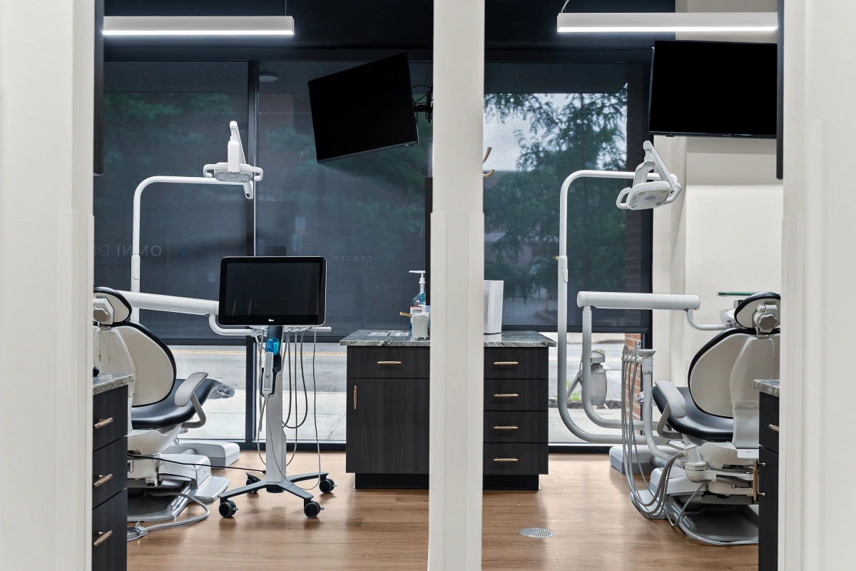 Dental practice room inside clinic with treatment chair and clinical equipment