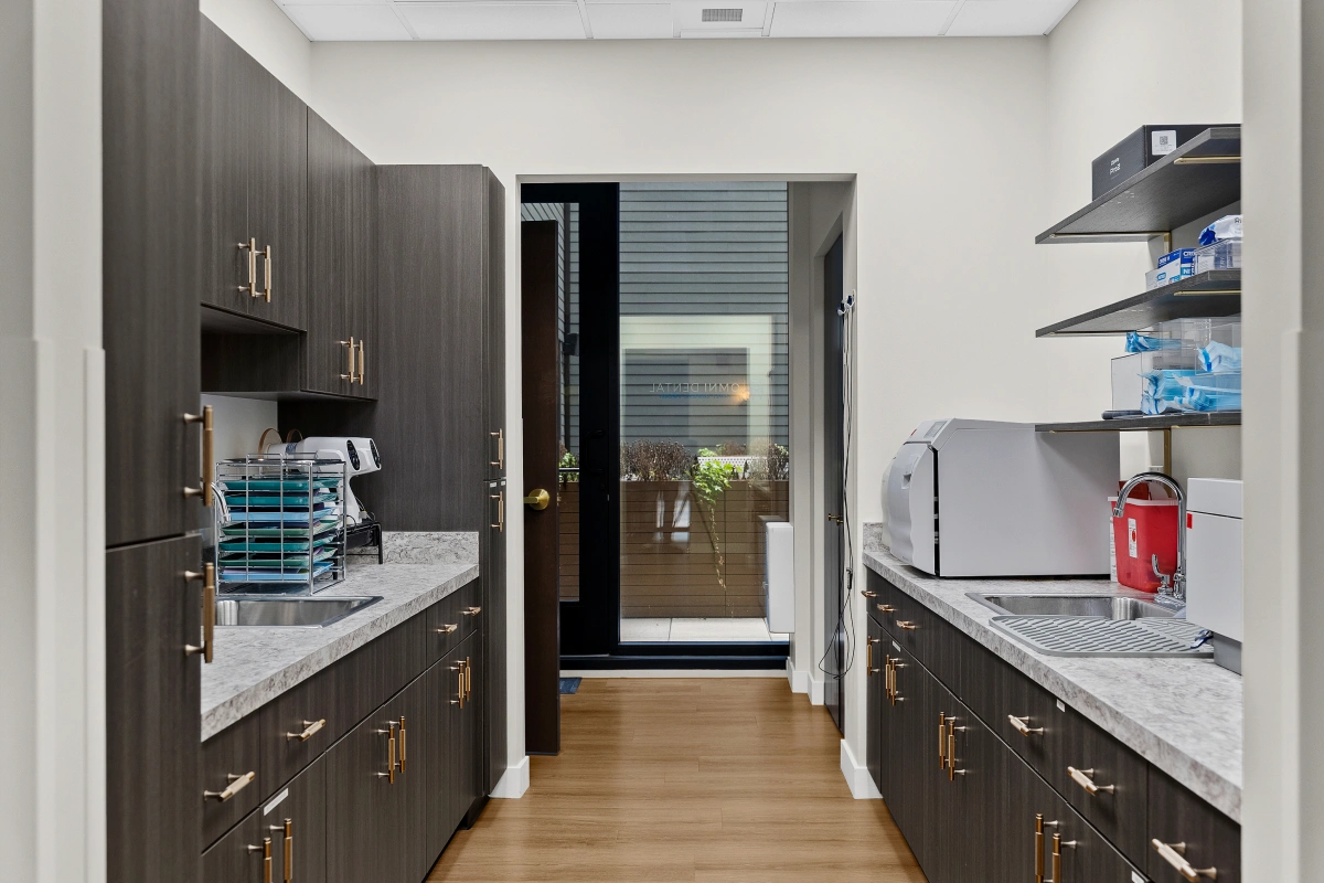 Omni Dental clinical work area with staff stations and treatment equipment