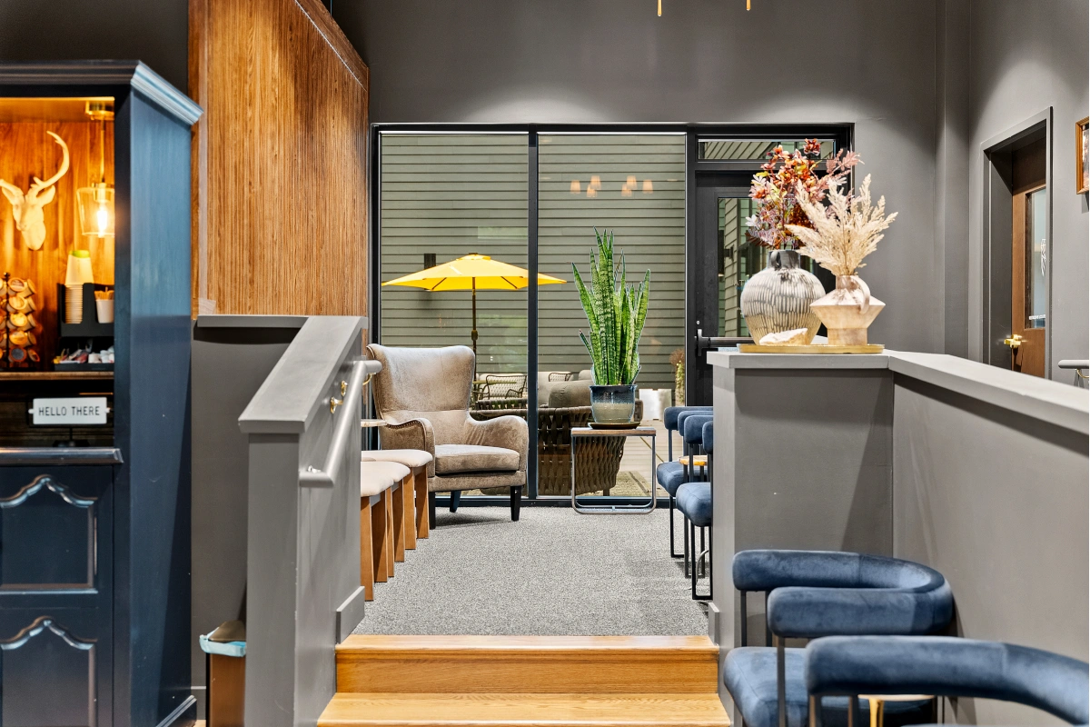 Omni Dental lounge area with natural light and patient seating
